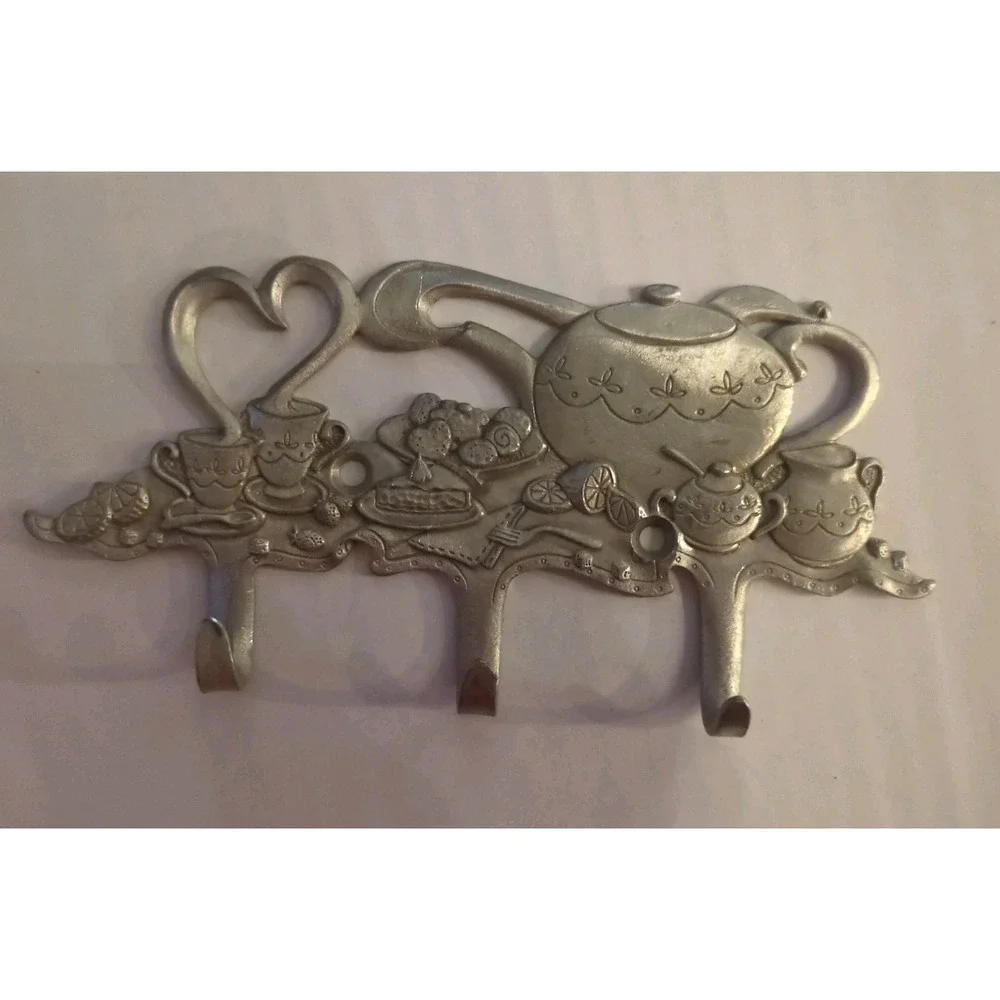 Practical solid pewter three-hook wall hanger in a teapot design